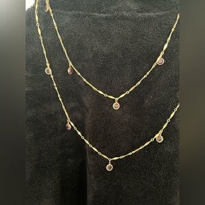 Elegant Gold Tone Necklace with Purple Crystal Accents